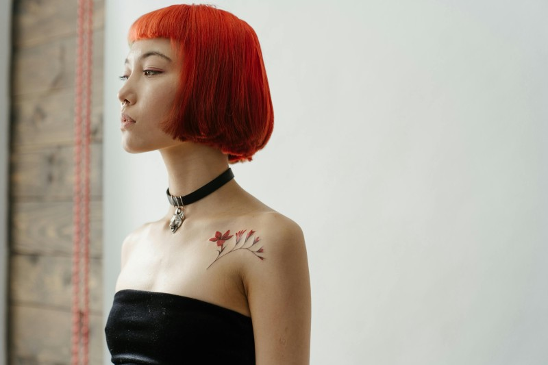 A woman with red hair color